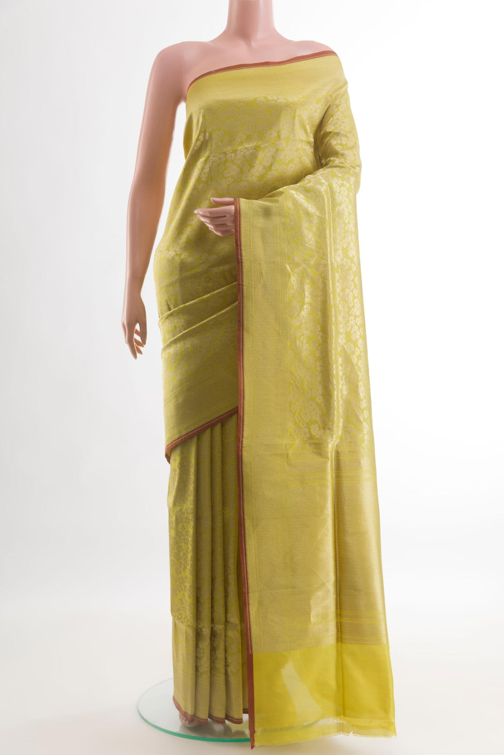 Yellow Banarasi Silk Saree with Zari Brocade on the body and Zari Border.  displayed on a mannequin