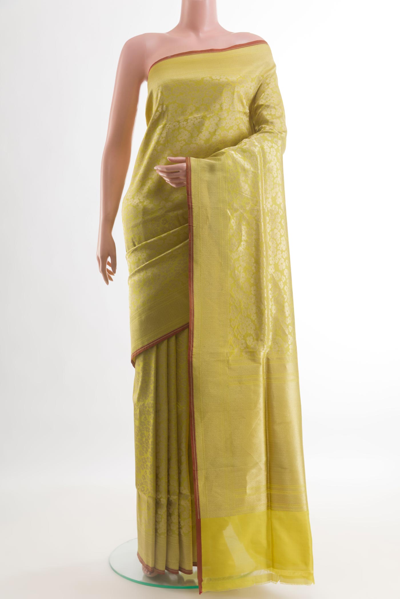 Yellow Banarasi Silk Saree with Zari Brocade on the body and Zari Border.  displayed on a mannequin