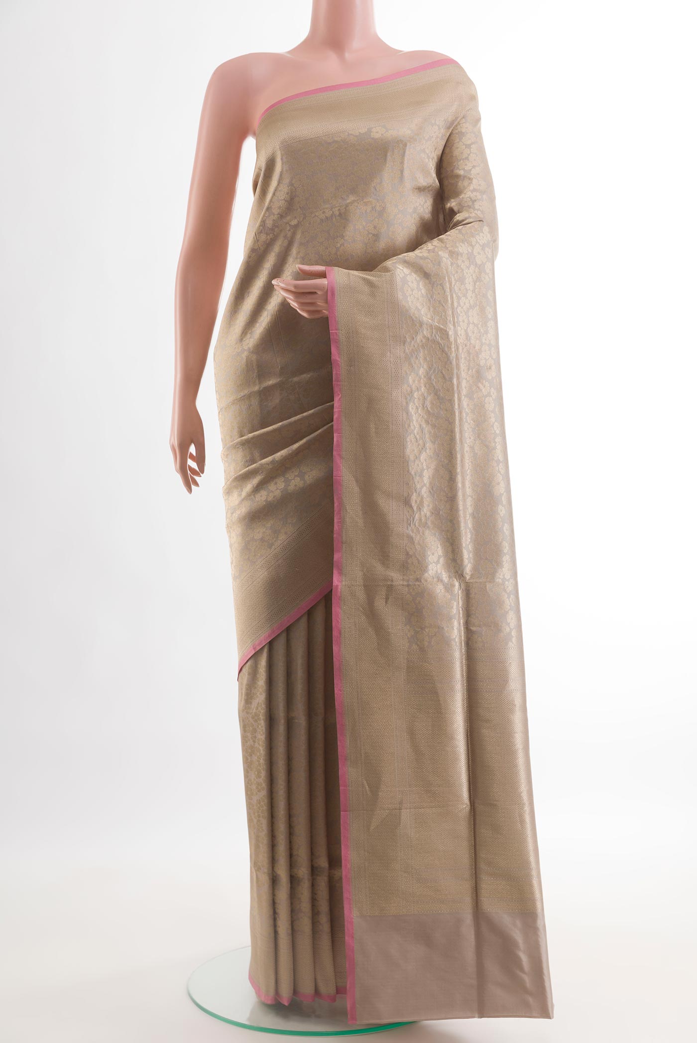Grey Banarasi Silk Saree with Zari Brocade on the body and Zari Border.  displayed on a mannequin
