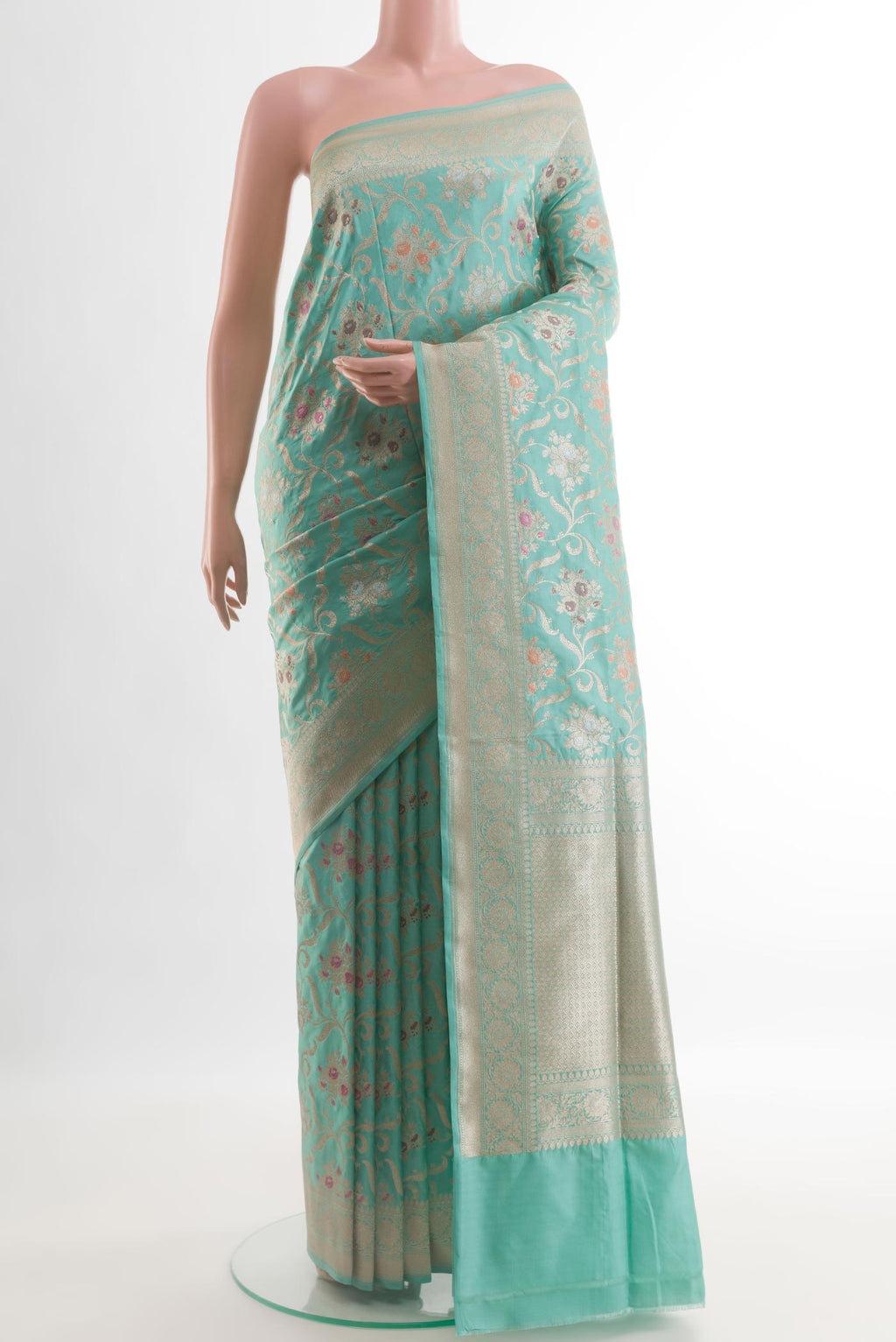 Light Blue Banarasi Silk Saree with Zari Brocade on the body and Zari Border.  displayed on a mannequin