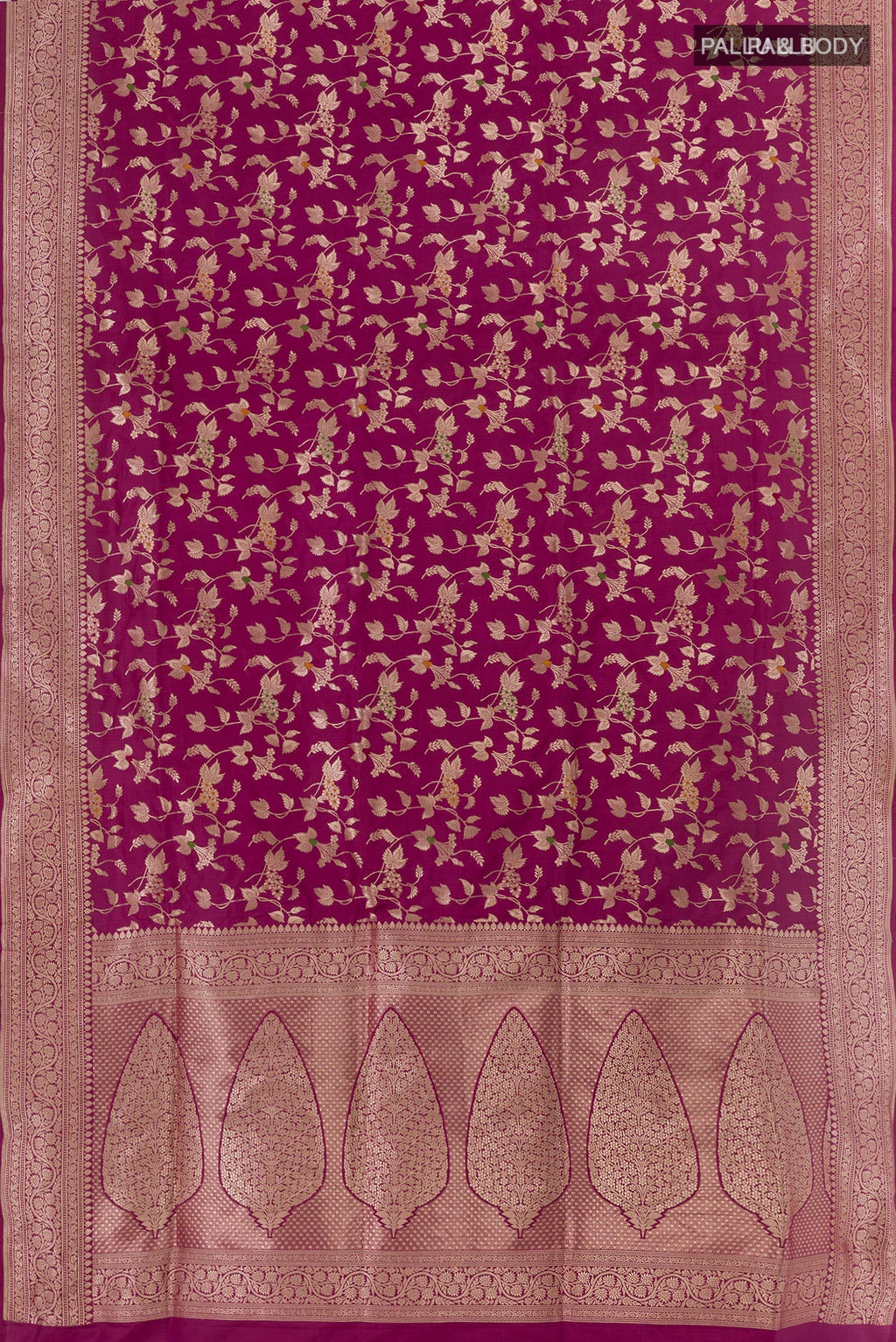 Flat view of Purple Banarasi Silk Saree with Zari Brocade on the body and Zari Border. 