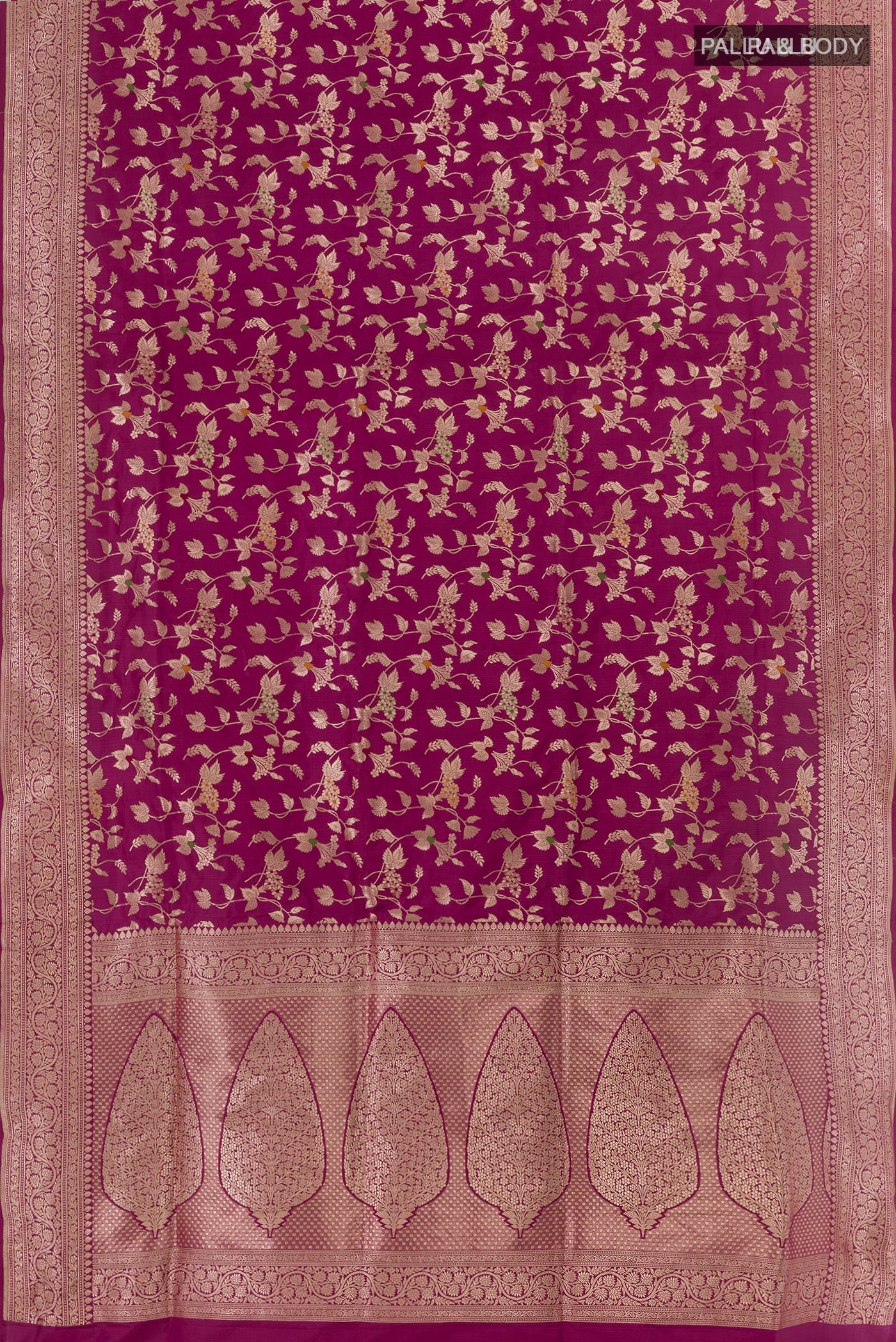 Flat view of Purple Banarasi Silk Saree with Zari Brocade on the body and Zari Border. 