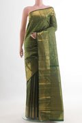 Bottle Green Kanchipuram Silk Saree with Zari Brocade on the body and Zari Border.  displayed on a mannequin