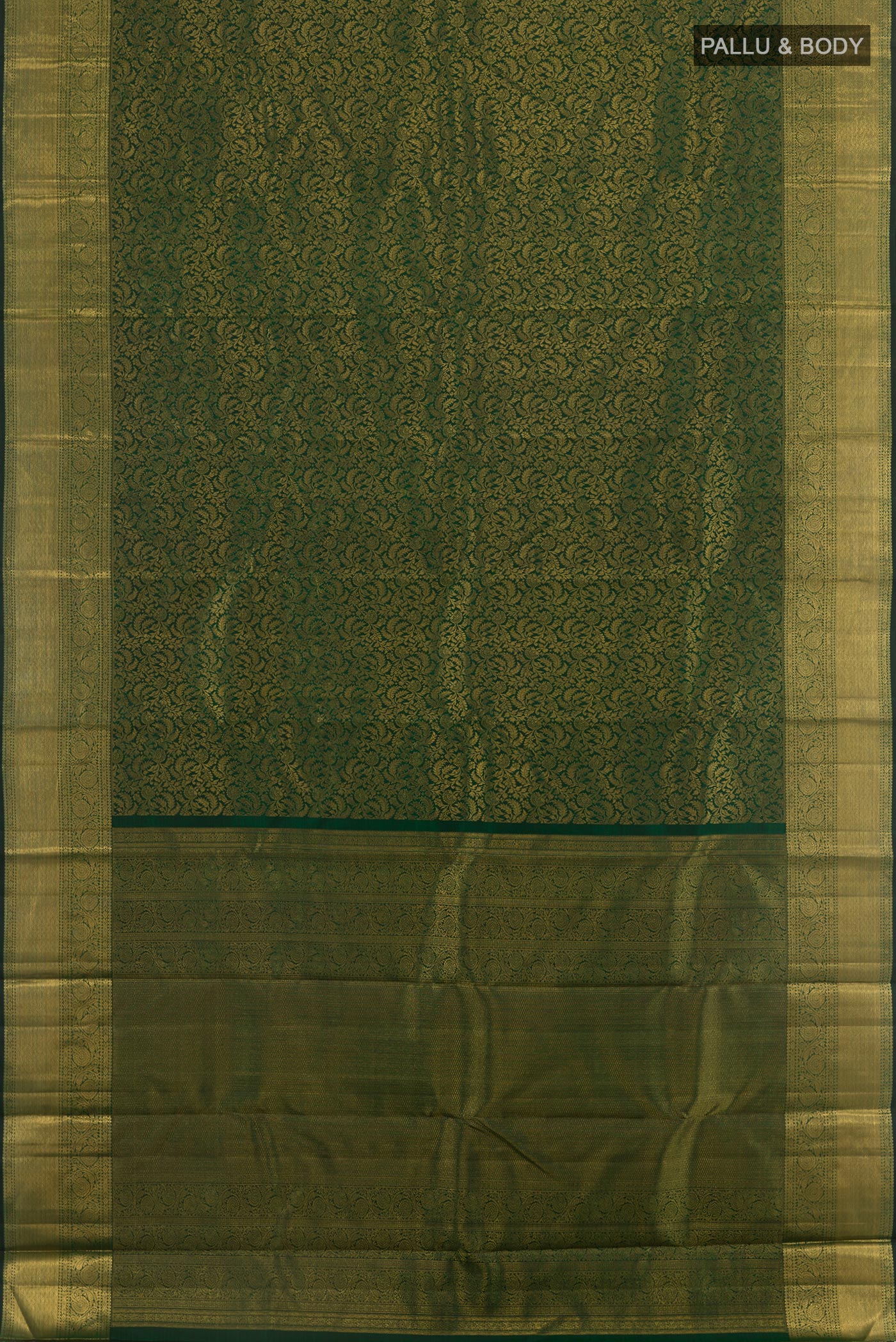 Flat view of Bottle Green Kanchipuram Silk Saree with Zari Brocade on the body and Zari Border. 