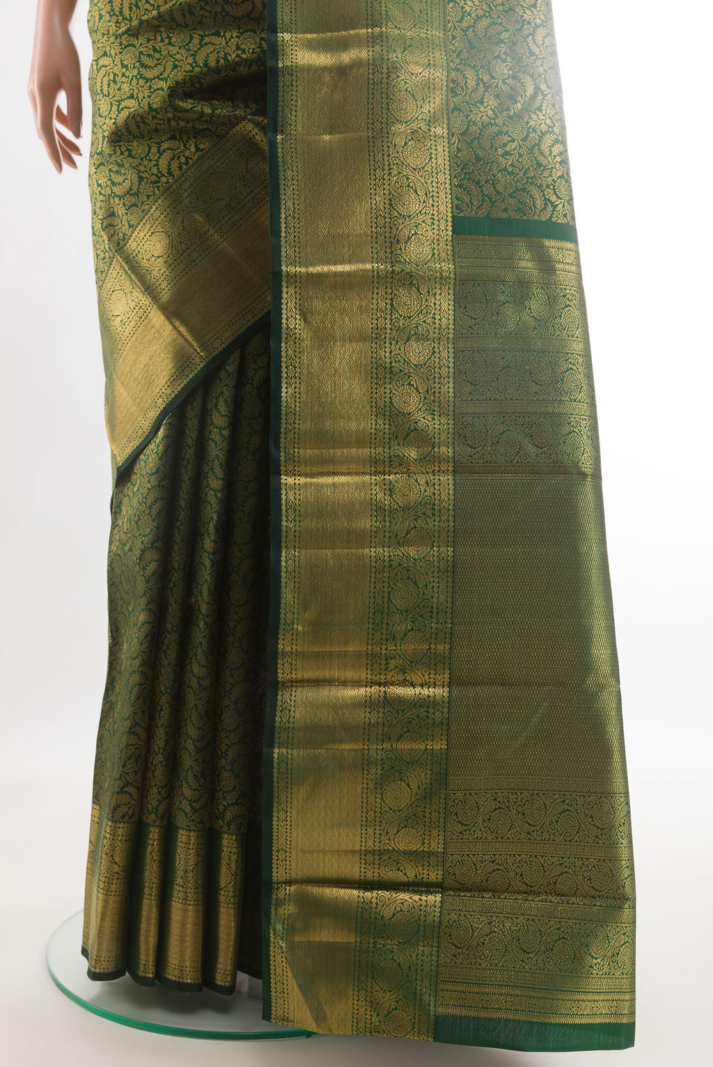 Pleats and pallu of Bottle Green Kanchipuram Silk Saree with Zari Brocade on the body and Zari Border. 