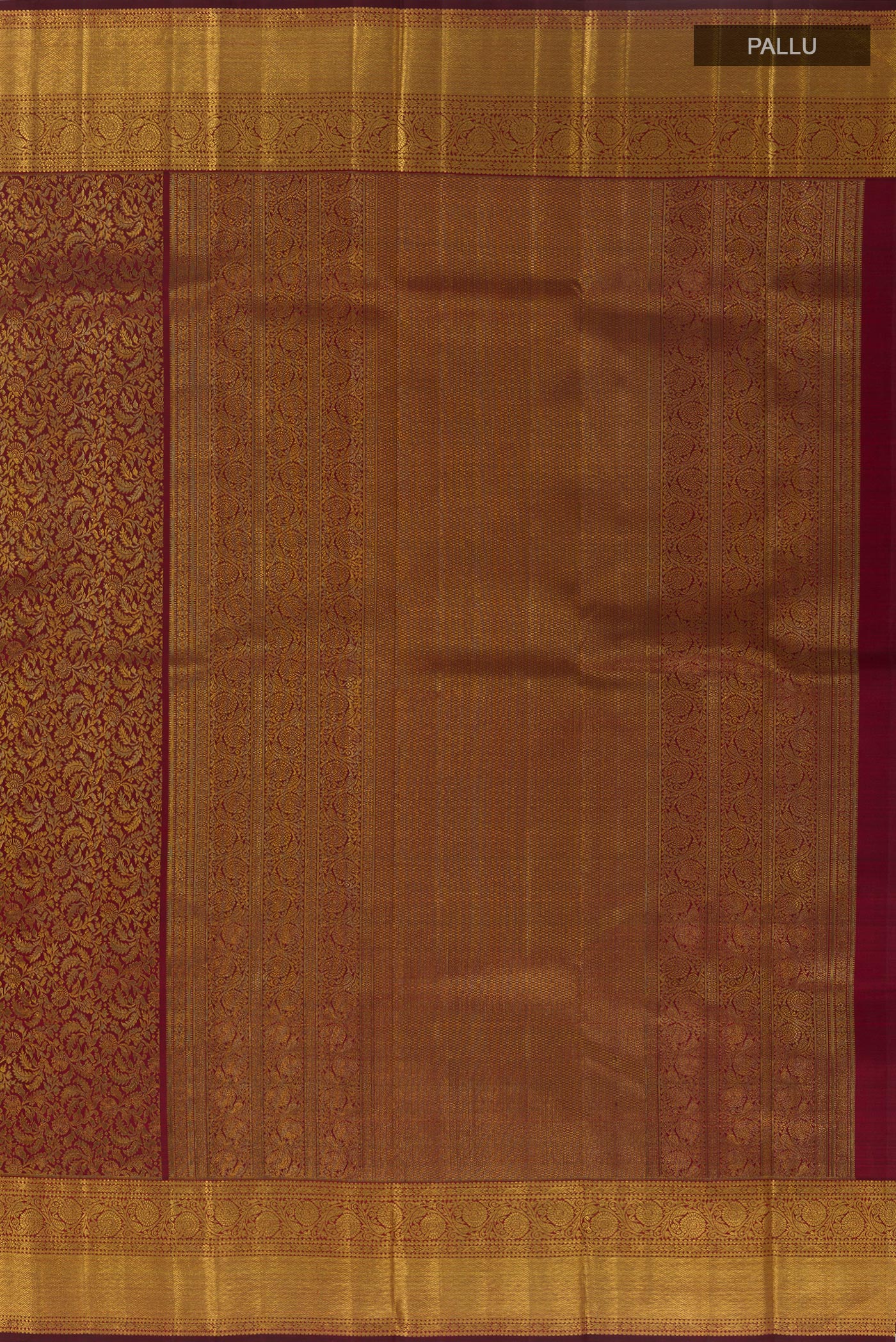 Close up image of the pallu of Maroon Kanchipuram Silk Saree with Zari Brocade on the body and Zari Border. 
