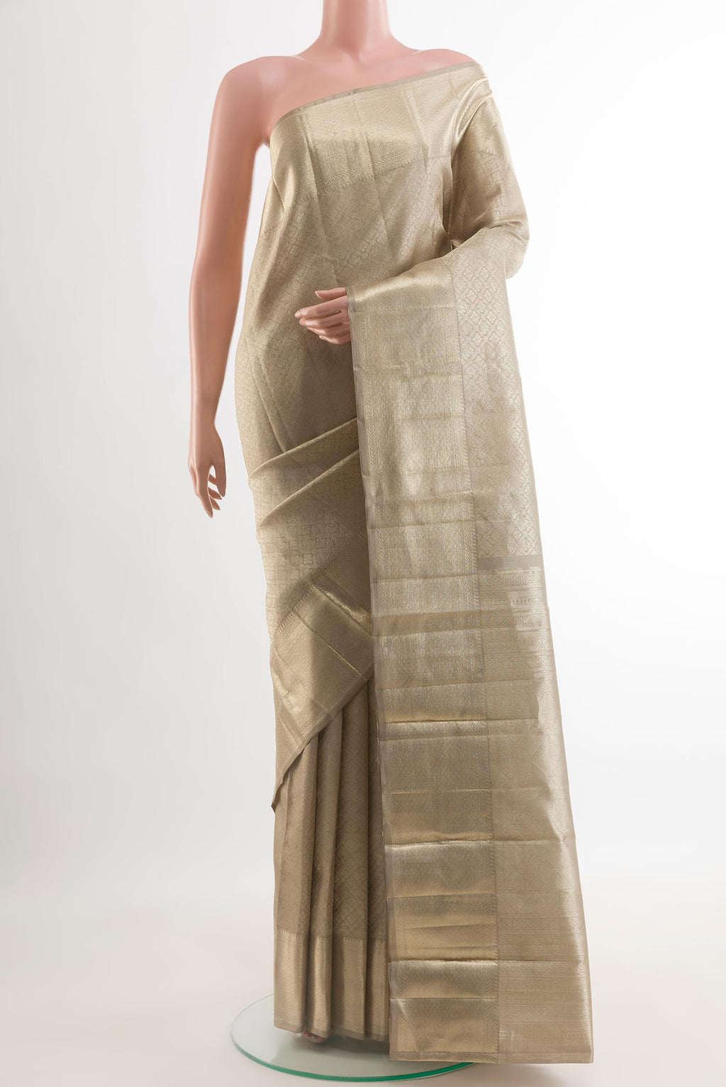 Grey Kanchipuram Silk Saree with Zari Brocade on the body and Zari Border.  displayed on a mannequin