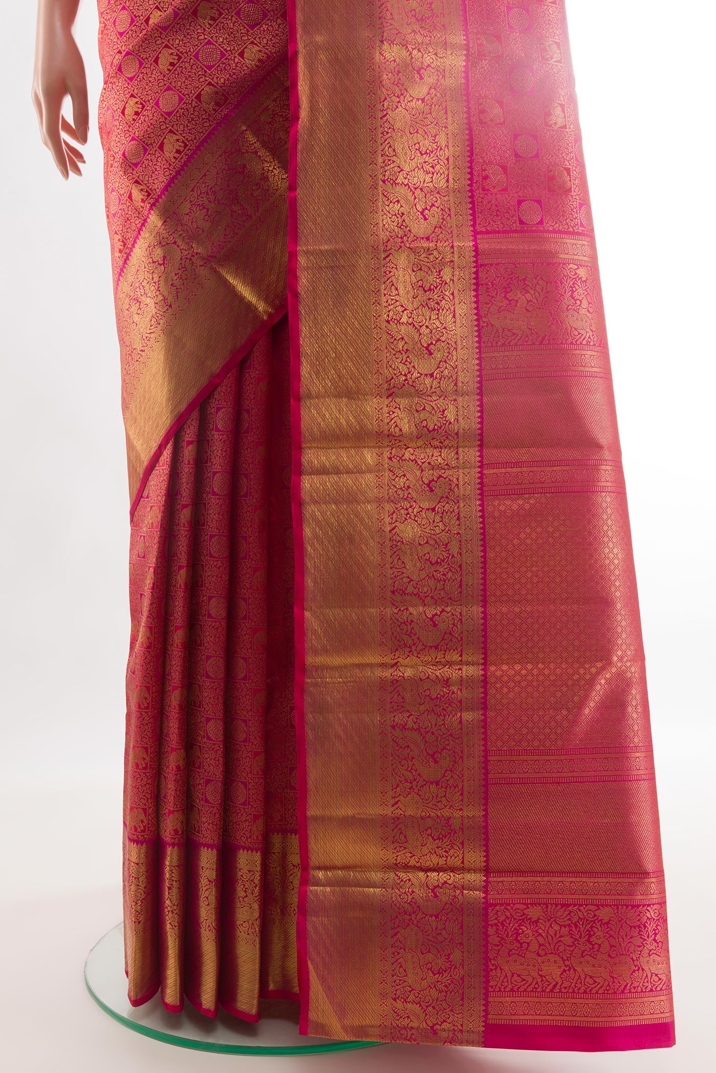 Pleats and pallu of Pink Kanchipuram Silk Saree with Zari Brocade on the body and Zari Border. 
