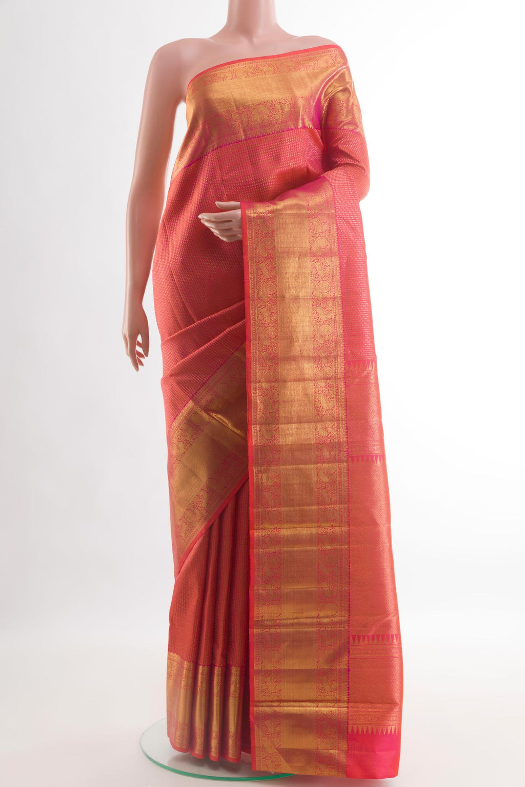Pink Kanchipuram Silk Saree with Zari Brocade on the body and Zari Border.  displayed on a mannequin