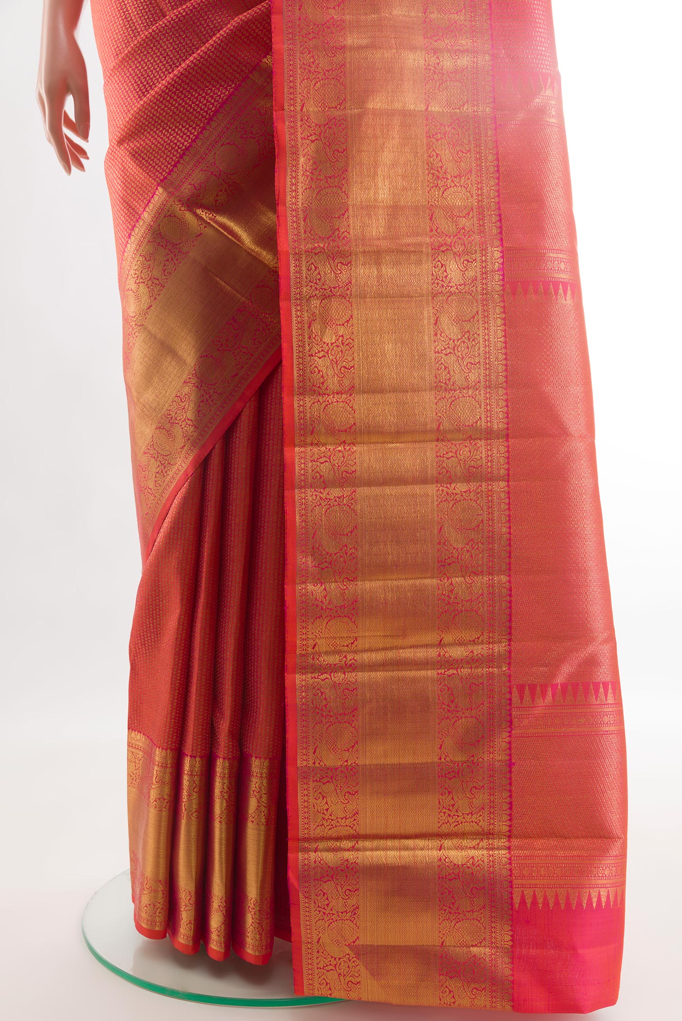 Pleats and pallu of Pink Kanchipuram Silk Saree with Zari Brocade on the body and Zari Border. 