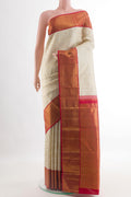 Off White Kanjivaram Silk Saree with Zari Brocade on the body and Zari Border.  displayed on a mannequin