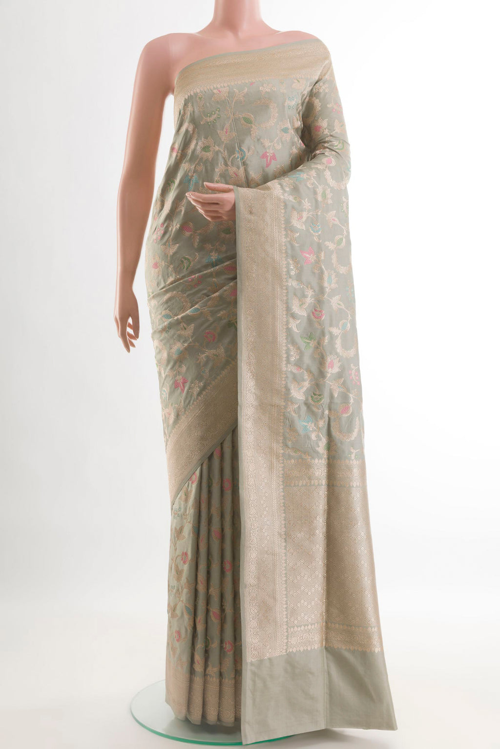 Grey Banarasi Silk Saree with Zari Brocade on the body and Zari Border.  displayed on a mannequin