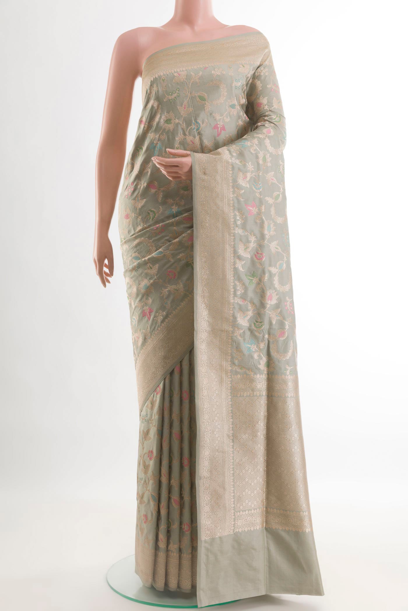 Grey Banarasi Silk Saree with Zari Brocade on the body and Zari Border.  displayed on a mannequin