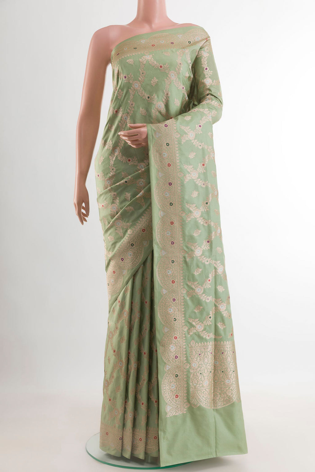Light Green Banarasi Silk Saree with Zari Brocade on the body and Zari Border.  displayed on a mannequin