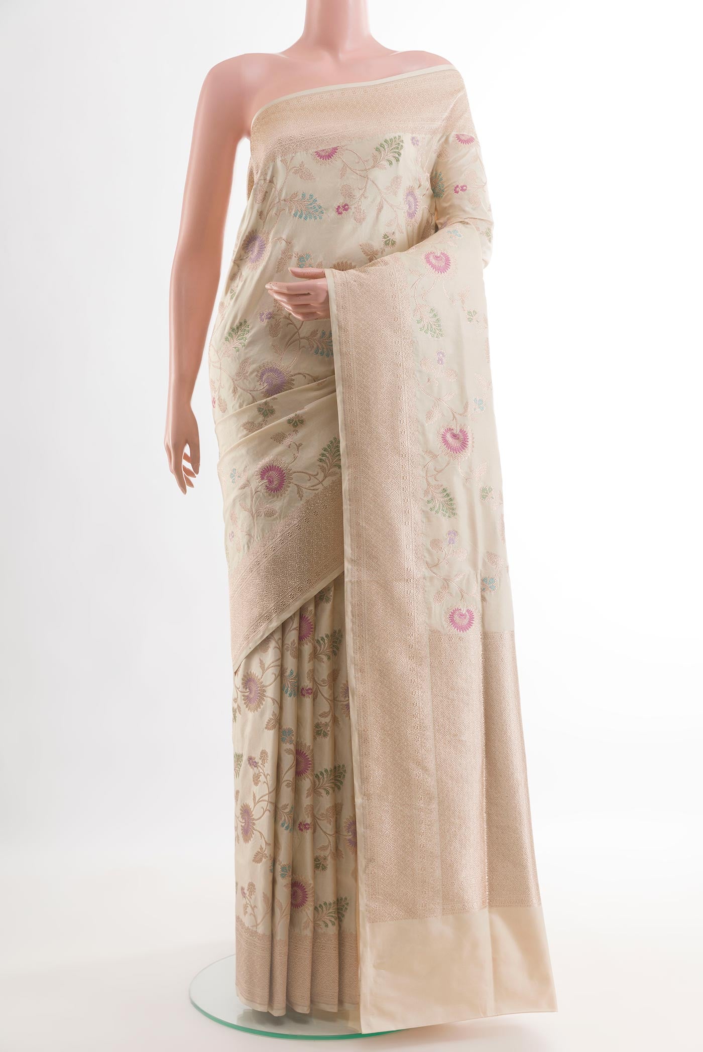 Cream Banarasi Silk Saree with Zari Brocade on the body and Zari Border.  displayed on a mannequin