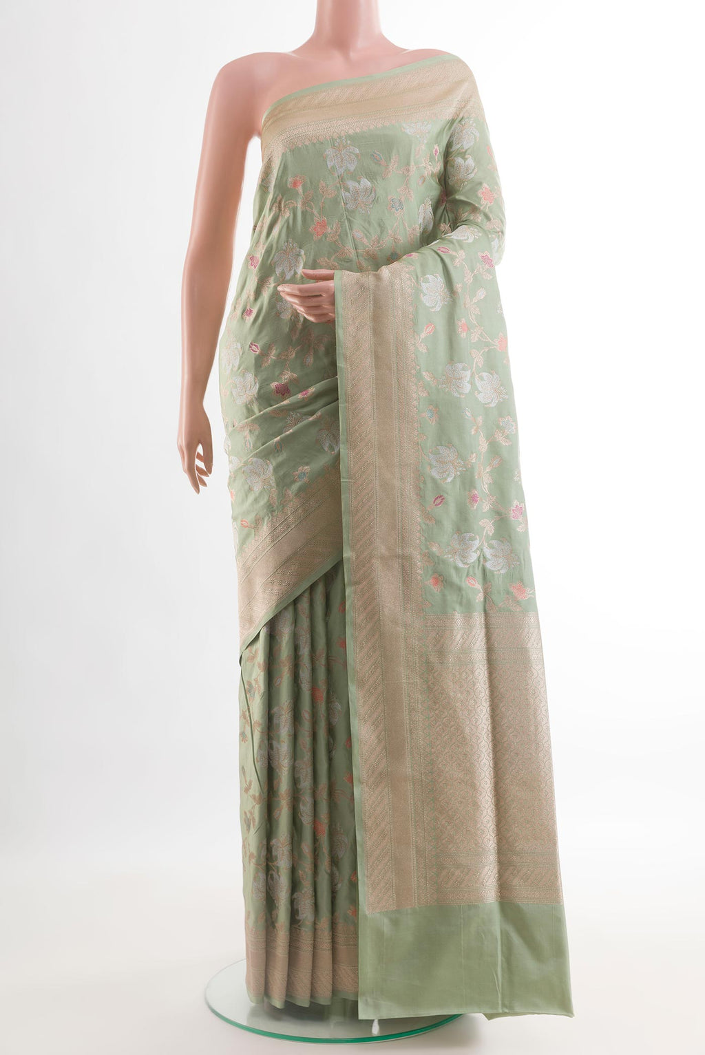 Sage Green Banarasi Silk Saree with Zari Brocade on the body and Zari Border.  displayed on a mannequin