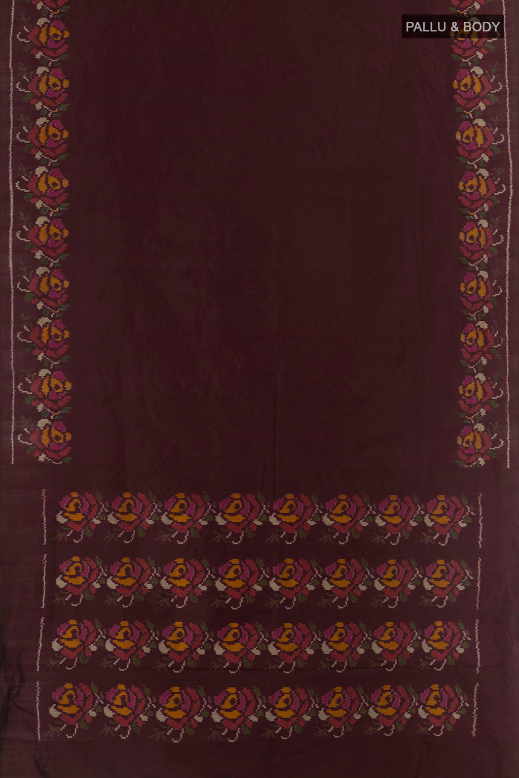 Flat view of Brown Pochampally Silk Saree with Plain Body and Ikat Border. 