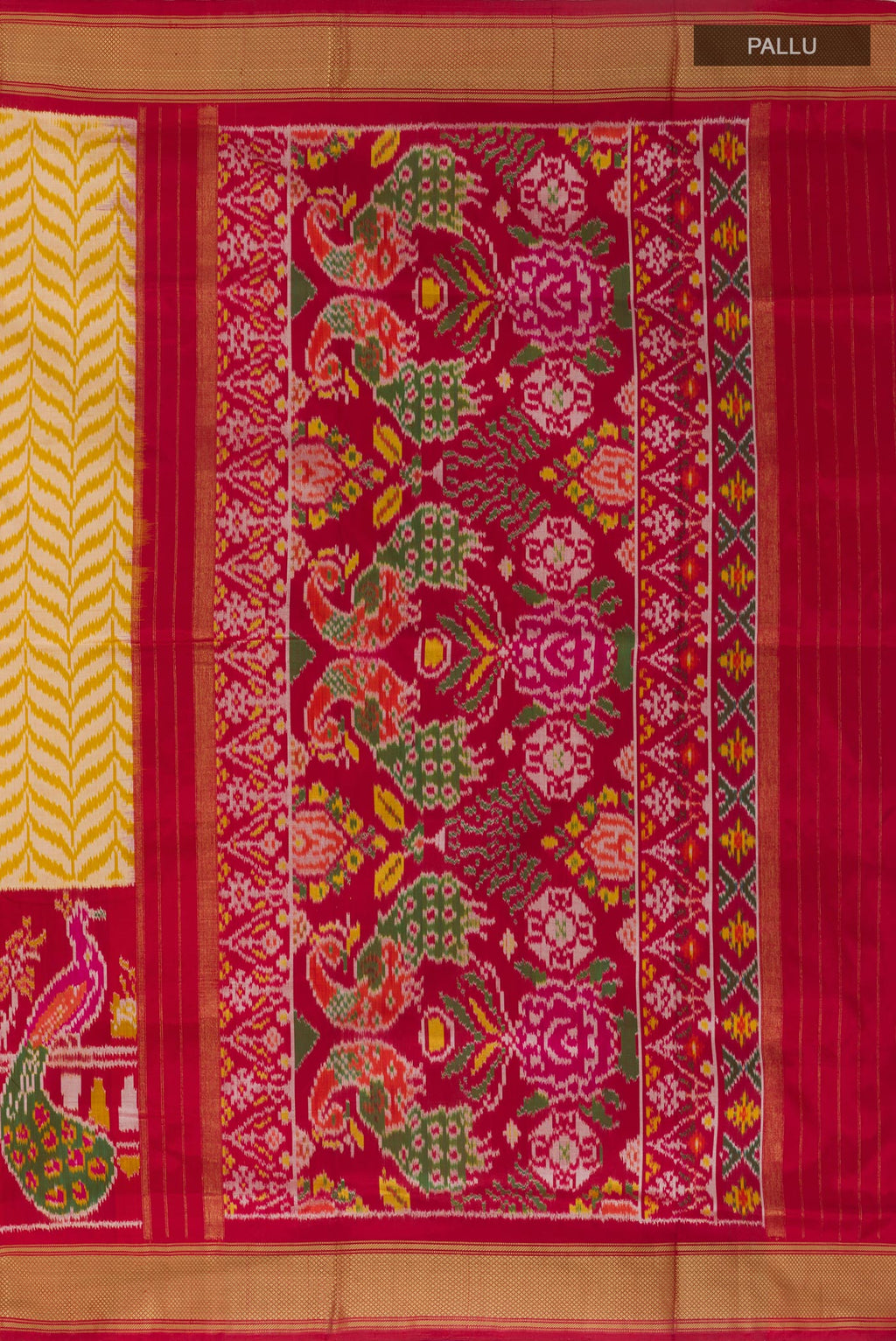 Close up image of the pallu of Yellow Pochampally Silk Saree with Pure Ikat on the body and Ikat Border. 