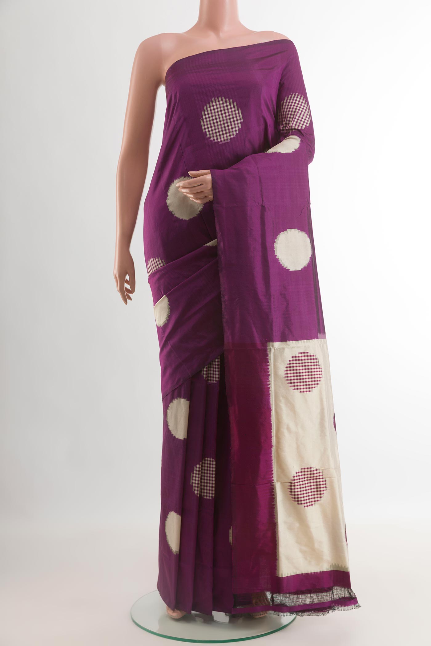 Purple Pochampally Silk Saree with Pure Ikat on the body and Without Border.  displayed on a mannequin