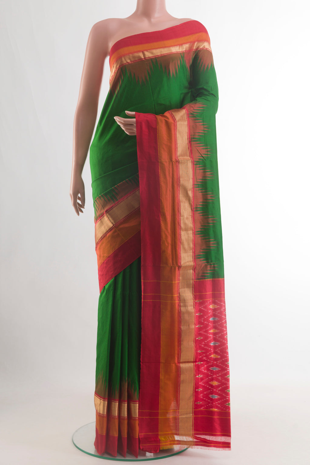 Green Pochampally Silk Saree with Plain Body and Zari Border.  displayed on a mannequin
