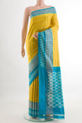 Yellow Pochampally Silk Saree with Pure Ikat on the body and Ikat Border.  displayed on a mannequin