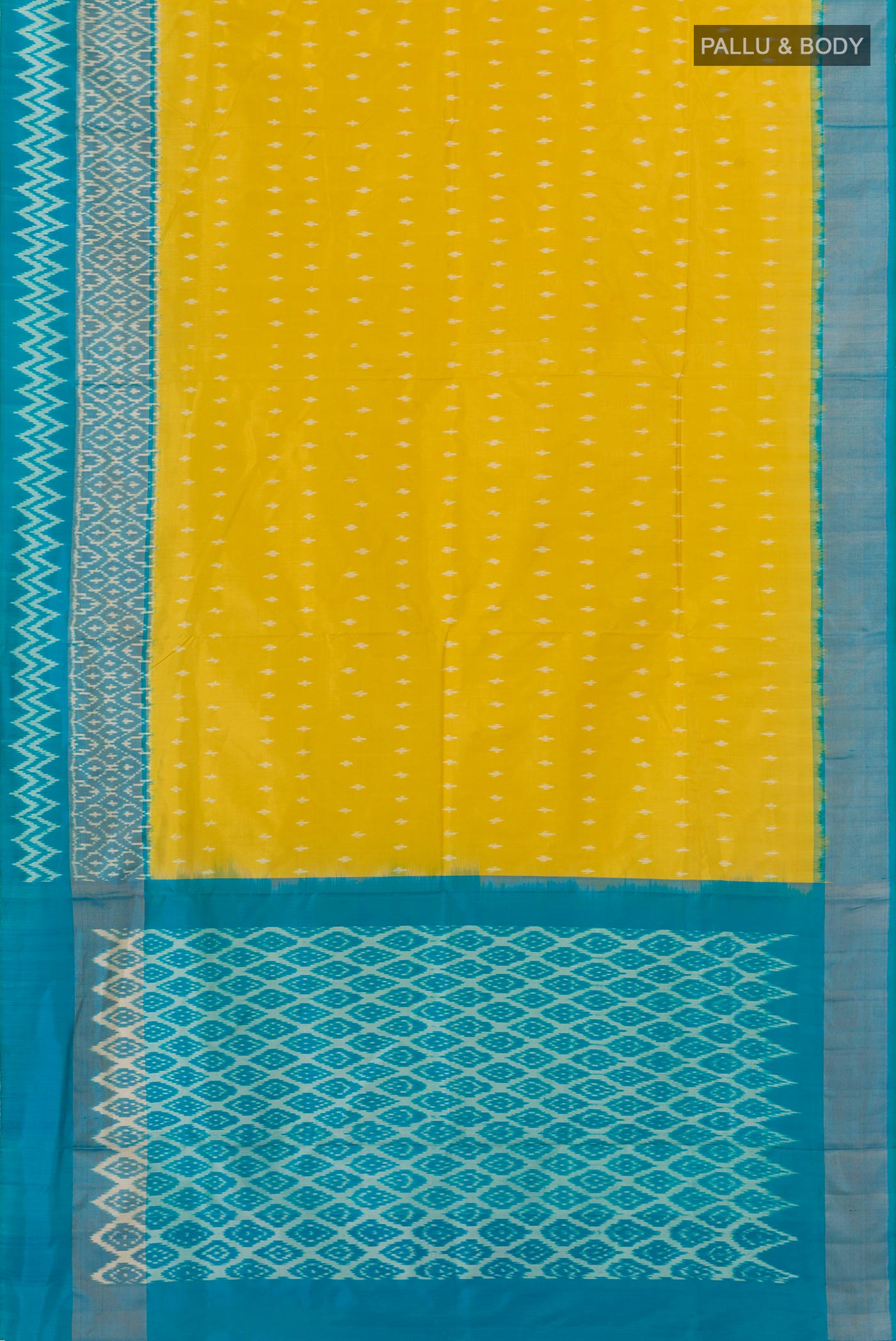 Flat view of Yellow Pochampally Silk Saree with Pure Ikat on the body and Ikat Border. 