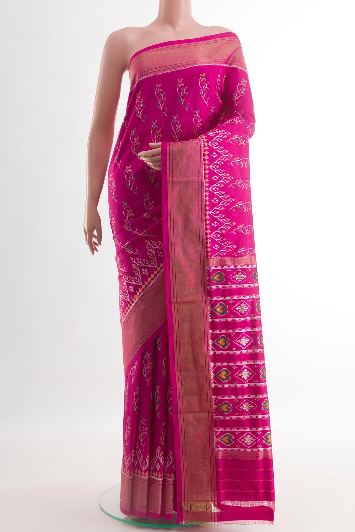 Light Magenta Pochampally Silk Saree with Pure Ikat on the body and Zari Border.  displayed on a mannequin