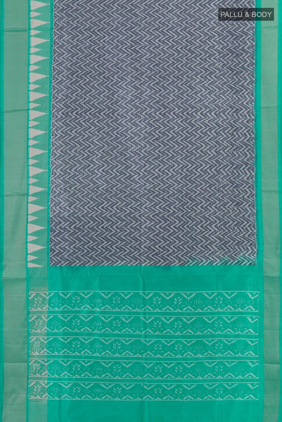 Flat view of Grey Pochampally Silk Saree with Pure Ikat on the body and Zari Border. 