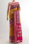 Mustard Pochampally Silk Saree with Plain Body and Zari Border.  displayed on a mannequin