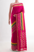 Rani Pink Pochampally Silk Saree with Pure Ikat on the body and Zari Border.  displayed on a mannequin