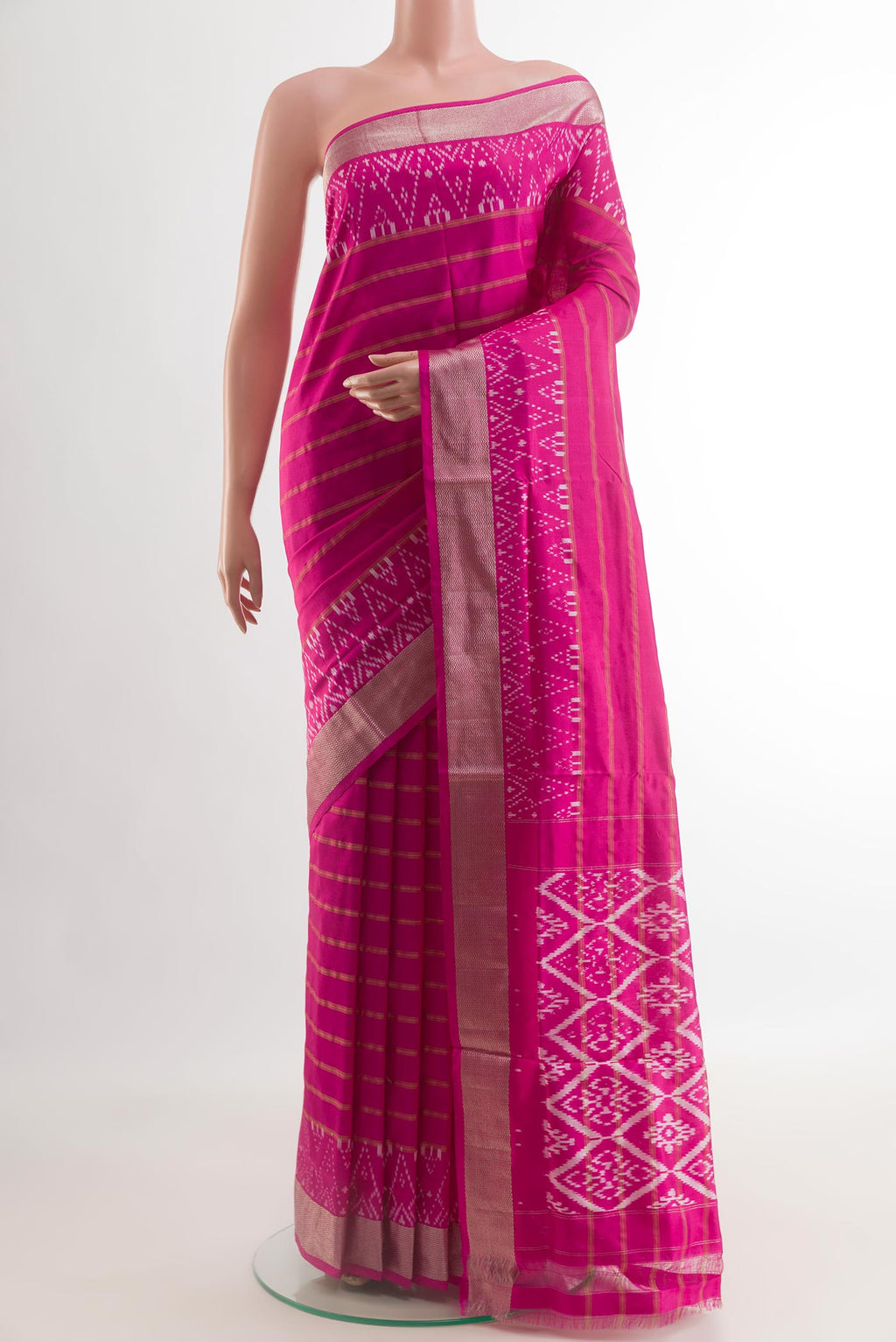 Light Magenta Pochampally Silk Saree with Stripes on the body and Zari Border.  displayed on a mannequin