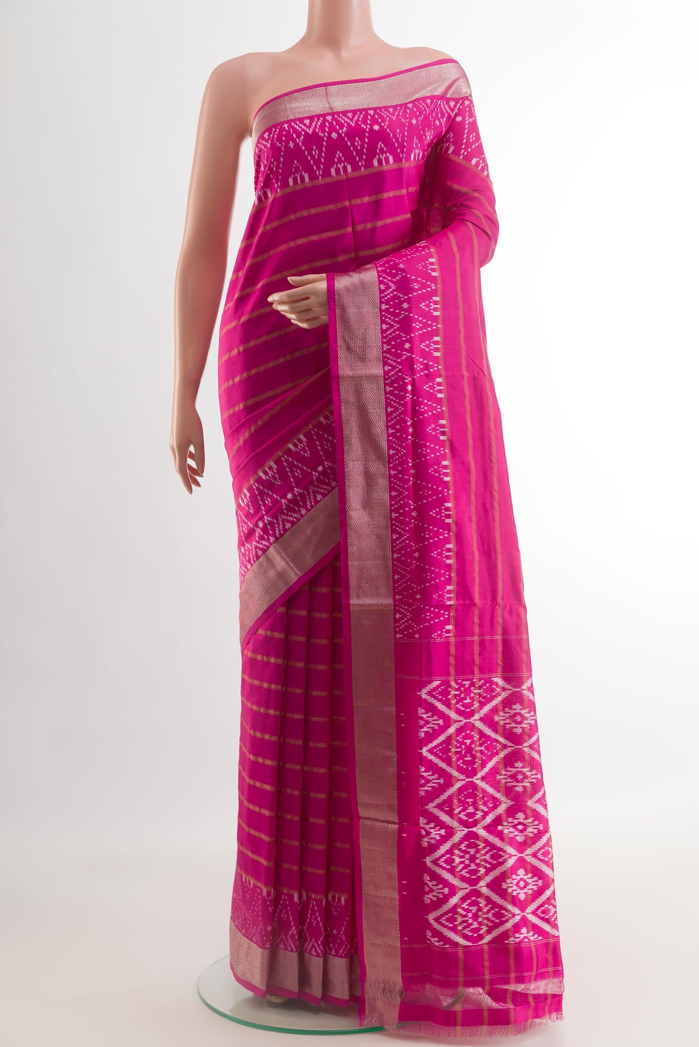 Light Magenta Pochampally Silk Saree with Stripes on the body and Zari Border.  displayed on a mannequin