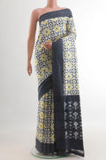 White Pochampally Silk Saree with Pure Ikat on the body and Plain Border.  displayed on a mannequin