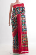 Multi Color Pochampally Silk Saree with Pure Ikat on the body and Zari Border.  displayed on a mannequin