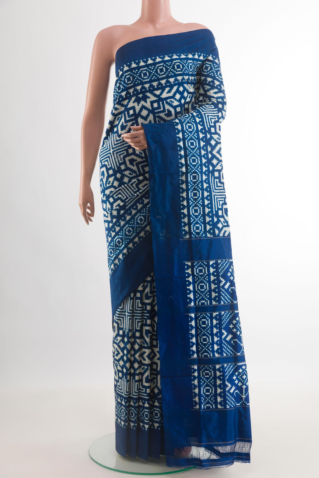 Blue Pochampally Silk Saree with Pure Ikat on the body and Ikat Border.  displayed on a mannequin