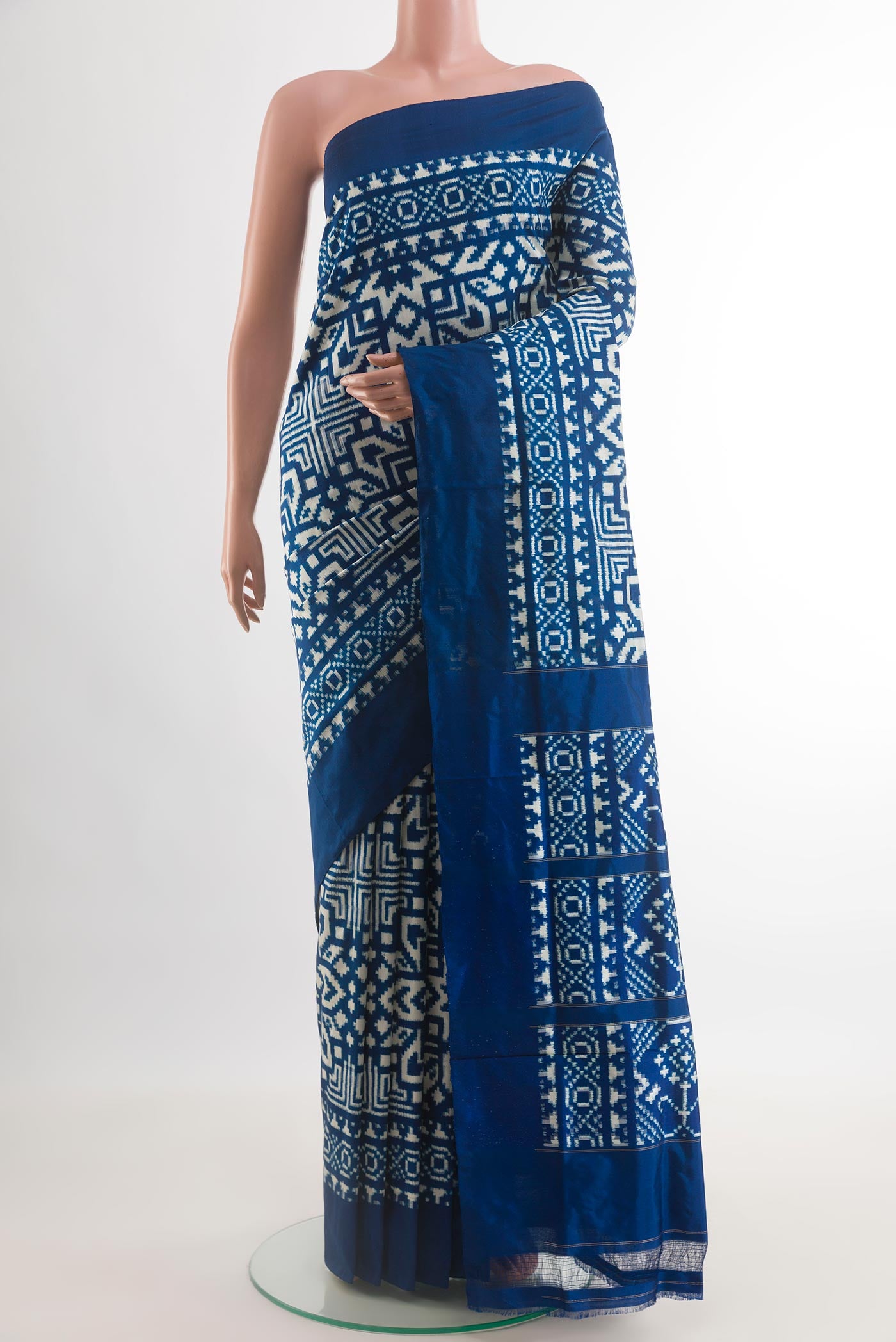 Blue Pochampally Silk Saree with Pure Ikat on the body and Ikat Border.  displayed on a mannequin