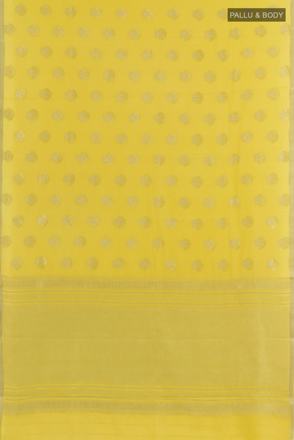 Flat view of Yellow Mysore Crepe Saree with Zari Butta on the body and Zari Border. 