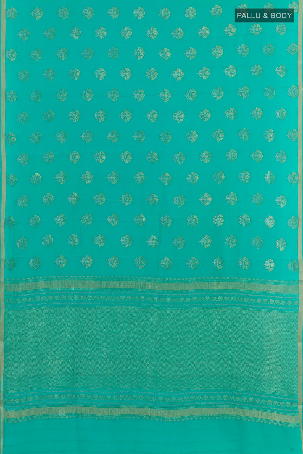 Flat view of Sea Green Mysore Crepe Saree with Zari Butta on the body and Zari Border. 