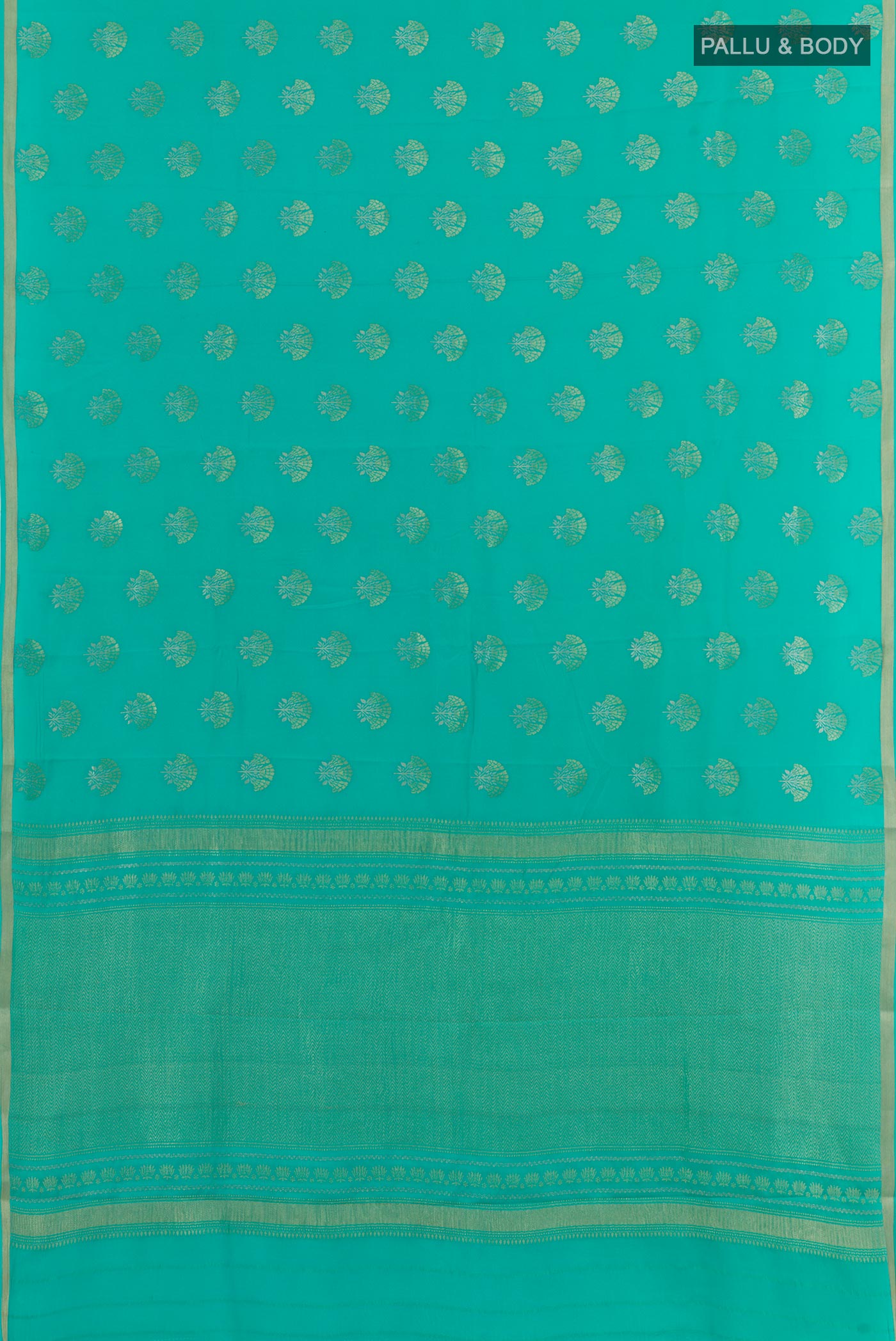 Flat view of Sea Green Mysore Crepe Saree with Zari Butta on the body and Zari Border. 