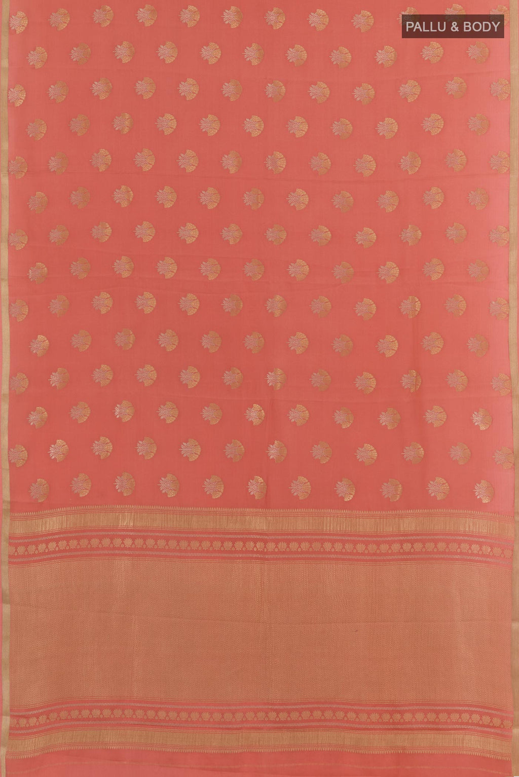Flat view of Peach Mysore Crepe Saree with Zari Butta on the body and Zari Border. 