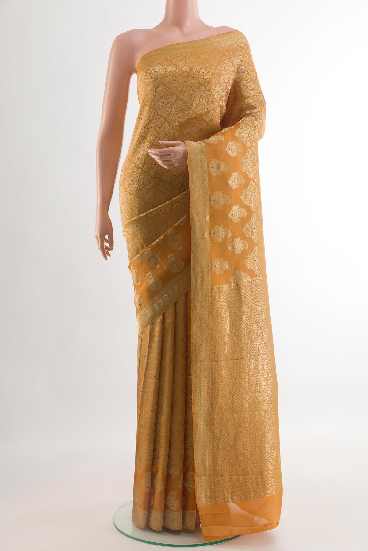 Yellow Mysore Crepe Saree with Zari Brocade on the body and Zari Border.  displayed on a mannequin