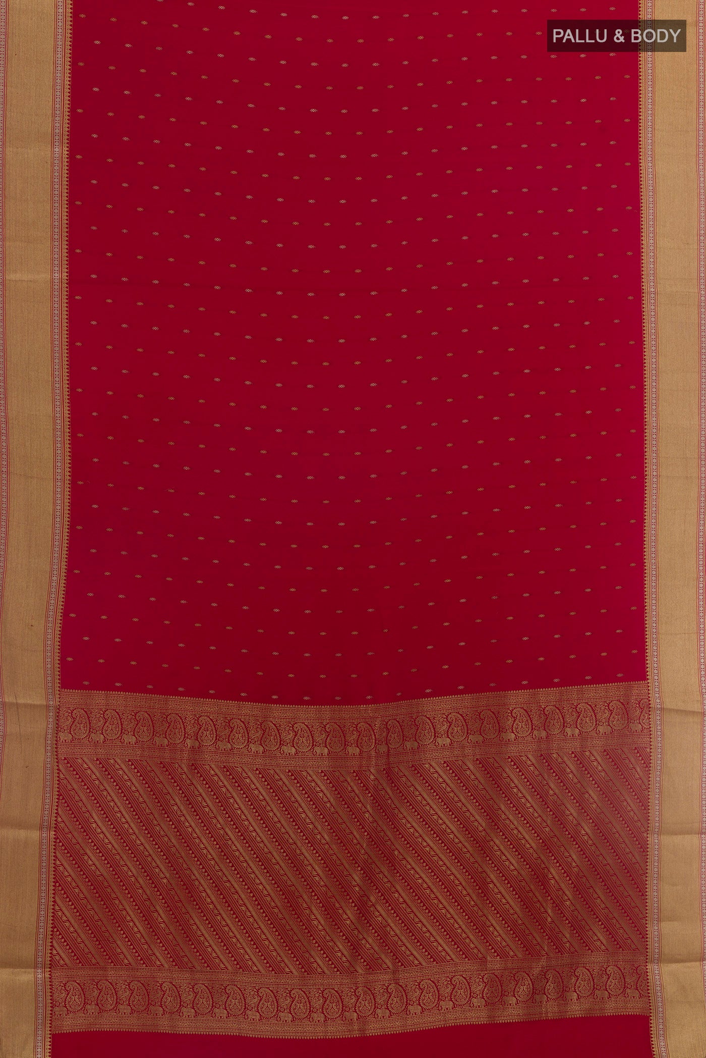 Flat view of Red Mysore Crepe Saree with Zari Butta on the body and Zari Border. 