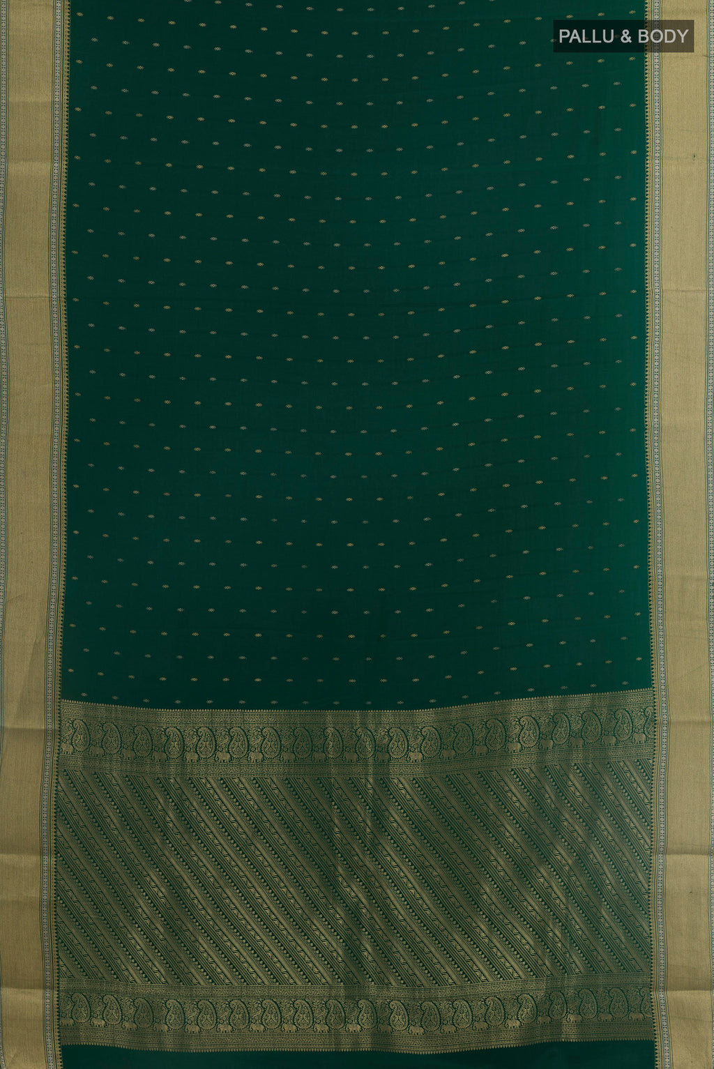 Flat view of Bottle Green Mysore Crepe Saree with Zari Butta on the body and Zari Border. 