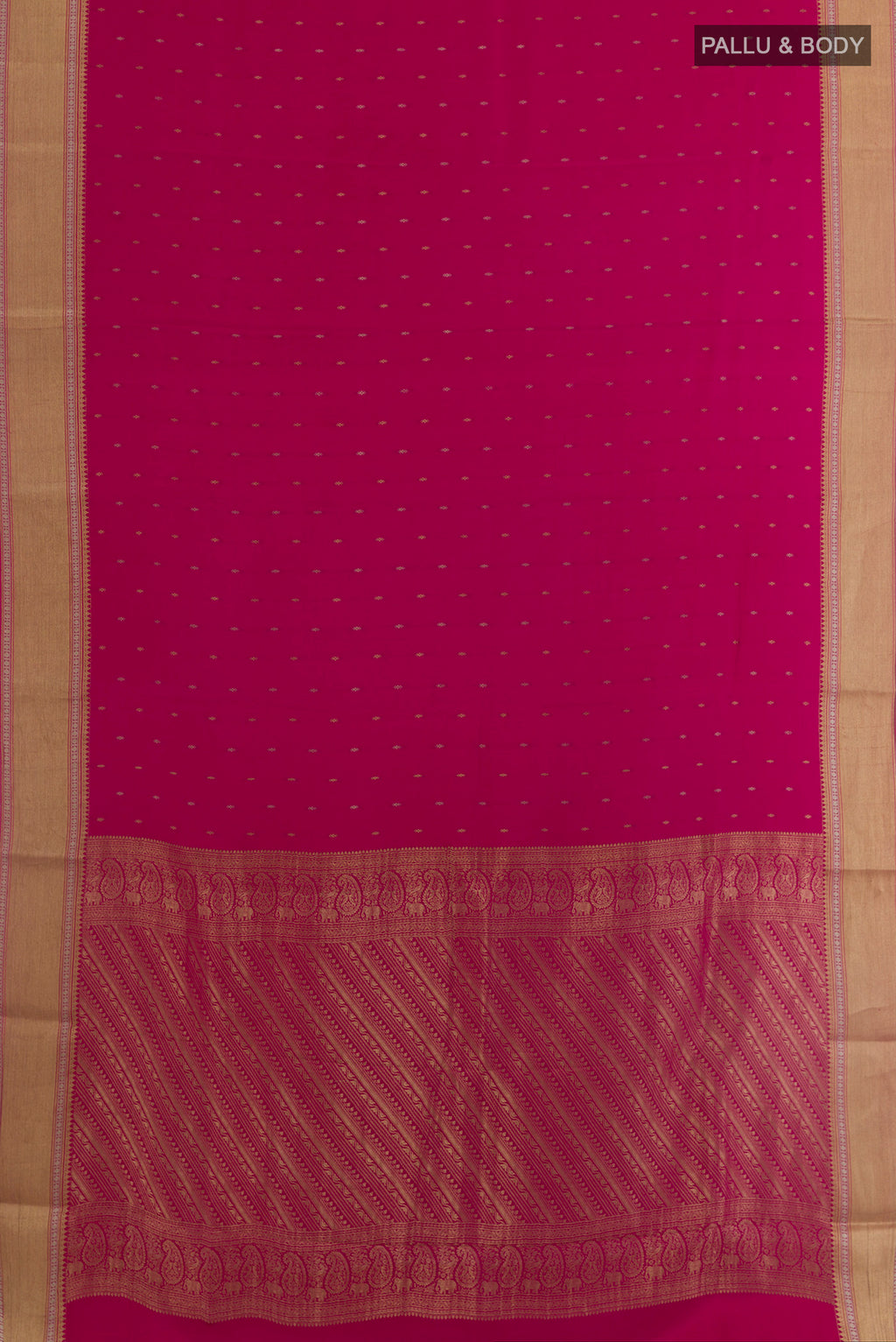 Flat view of Rani Pink Mysore Crepe Saree with Zari Butta on the body and Zari Border. 