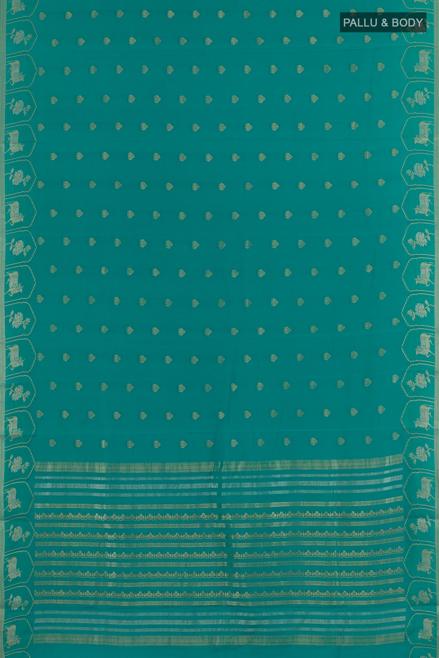 Flat view of Sea Green Mysore Crepe Saree with Zari Butta on the body and Zari Border. 