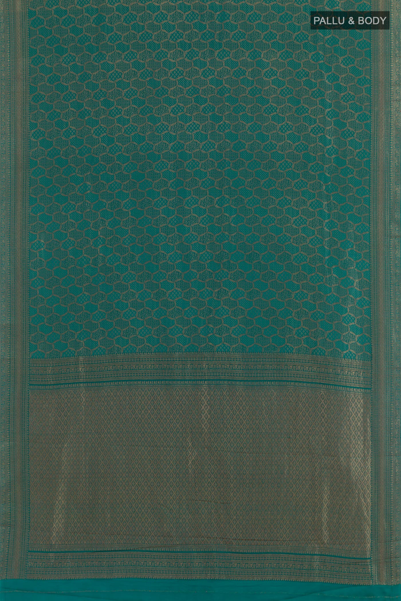 Flat view of Teal Mysore Crepe Saree with Zari Brocade on the body and Zari Border. 