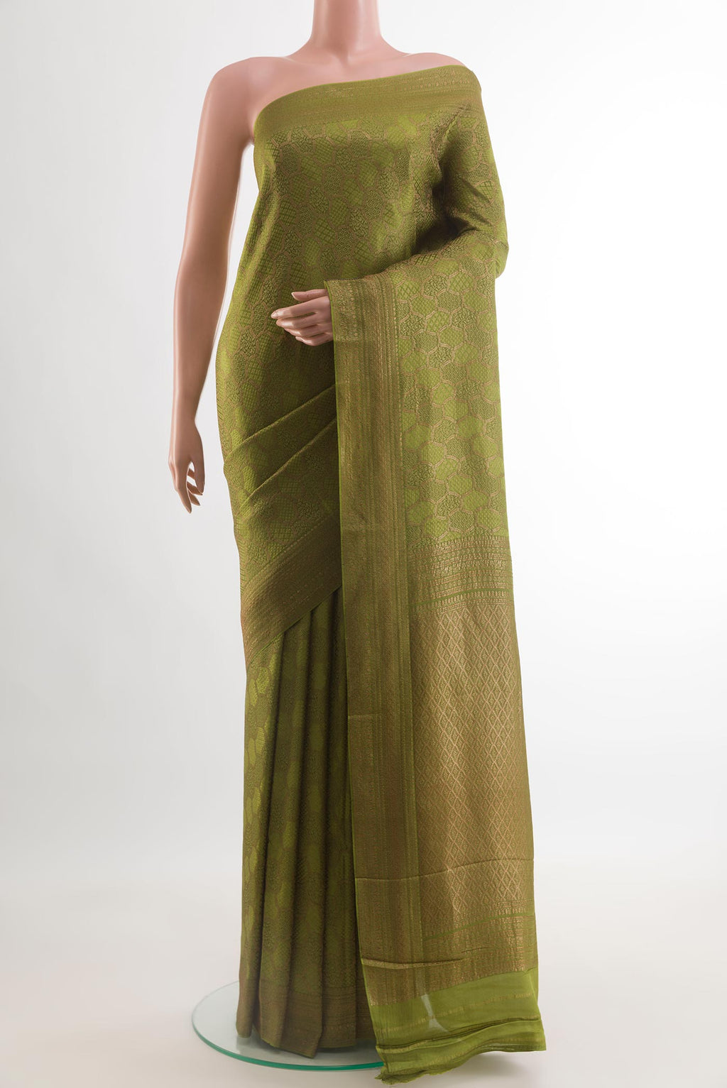Mehandi Green Mysore Crepe Saree with Zari Brocade on the body and Zari Border.  displayed on a mannequin