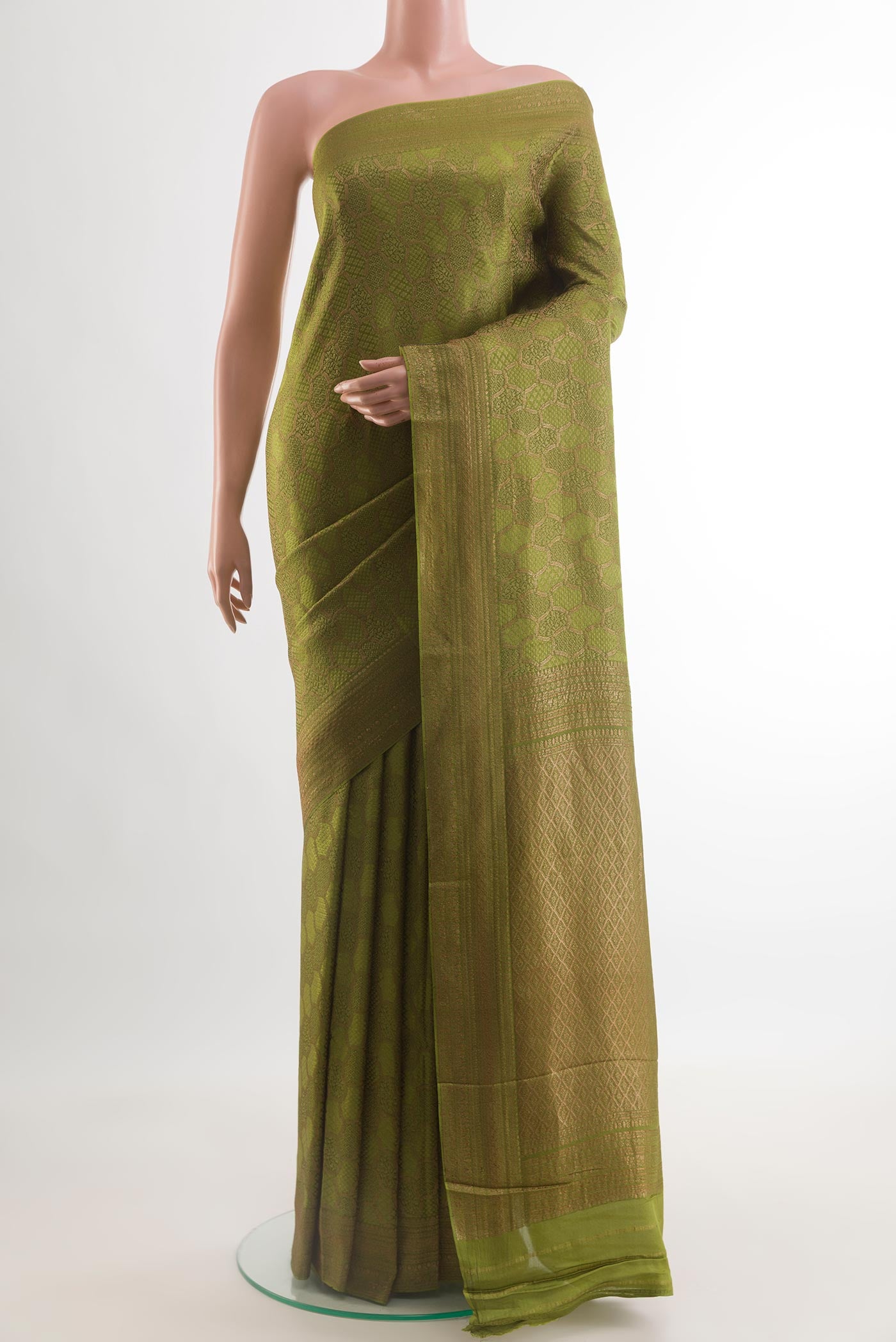 Mehandi Green Mysore Crepe Saree with Zari Brocade on the body and Zari Border.  displayed on a mannequin