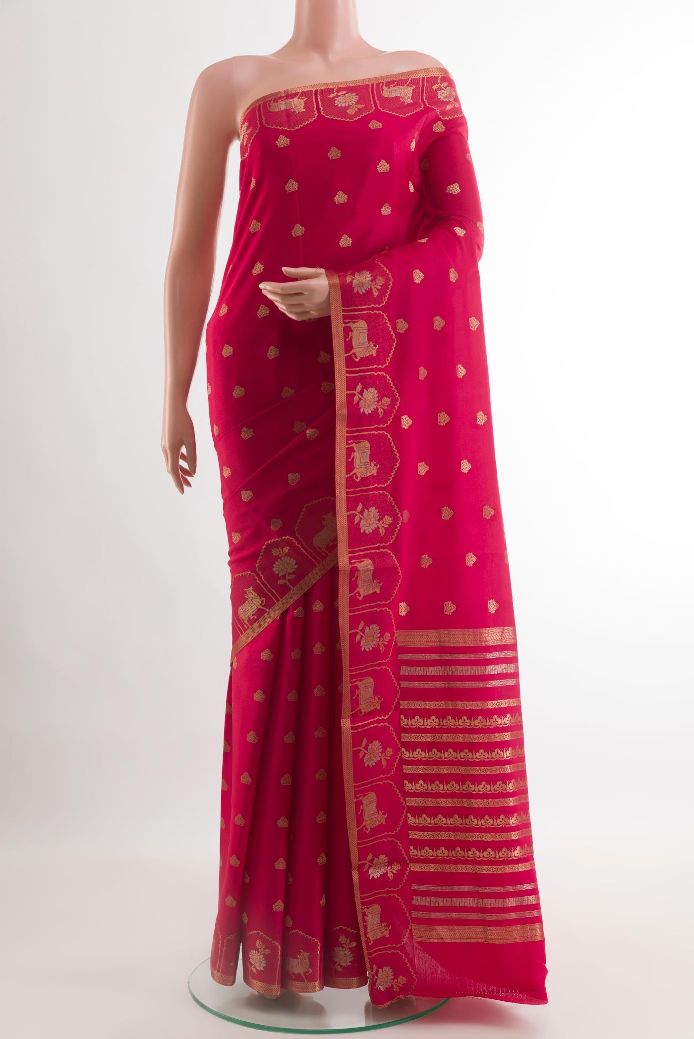 Pink Mysore Crepe Saree with Zari Butta on the body and Zari Border.  displayed on a mannequin