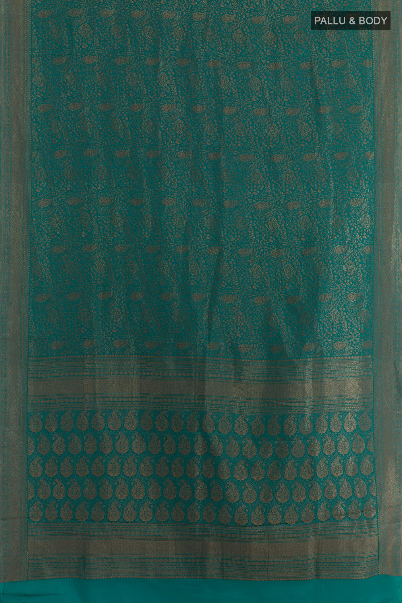 Flat view of Teal Mysore Crepe Saree with Zari Brocade on the body and Zari Border. 